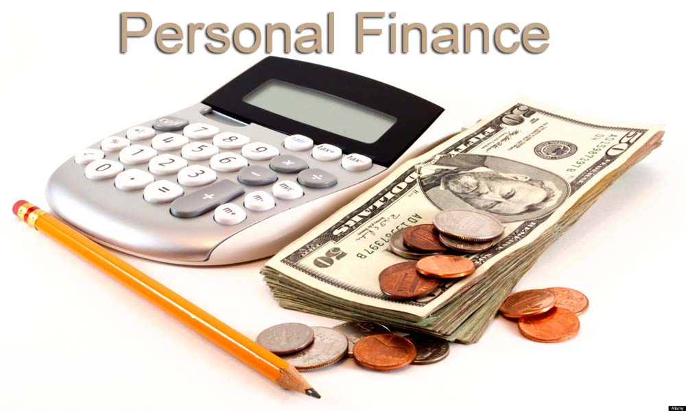 Personal finance and accounting with calculator, money and yellow pencil isolated on white background.. Image shot 2012. Exact date unknown.